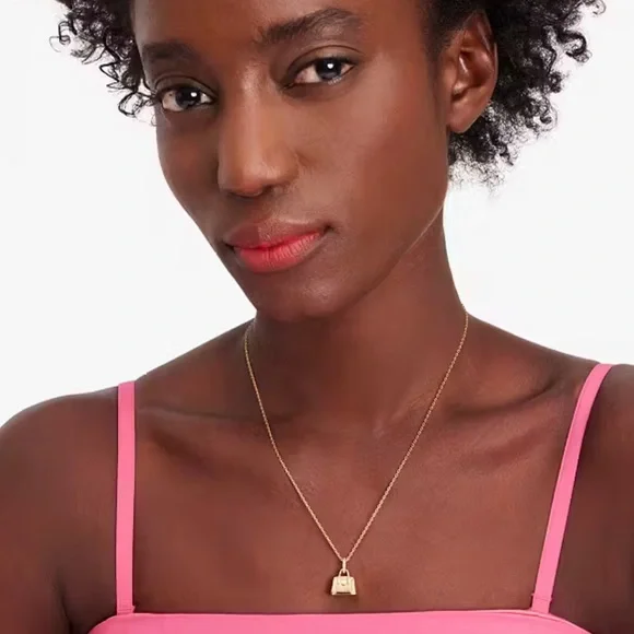 KATE SPADE Hit The Town Knott Crystal Purse Pendant Necklace. NWT - Picture 2 of 8